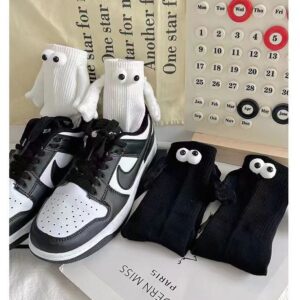 Googly Eyes holding hands